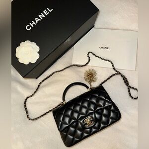 CHANEL Black Lambskin Mini Top Handle Flap Bag with Lion Charm